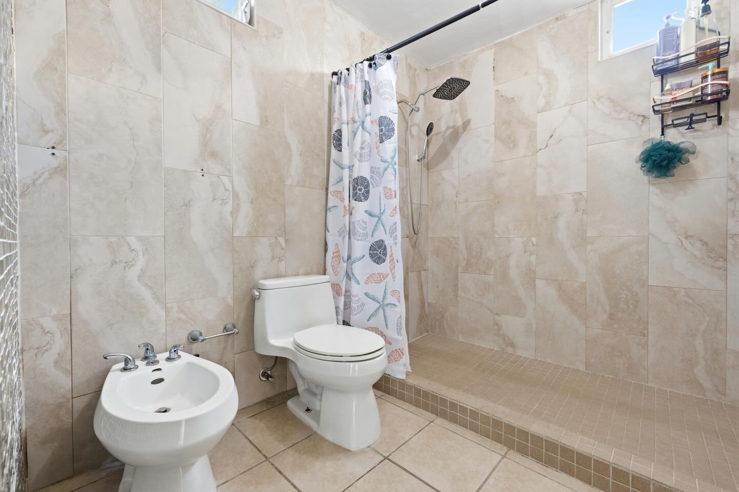 Walk-in shower with stone tile